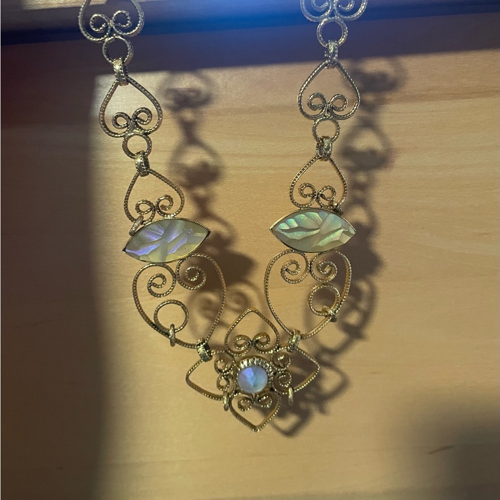 Gold Artistic Wire Necklace with Intricate Swirls
